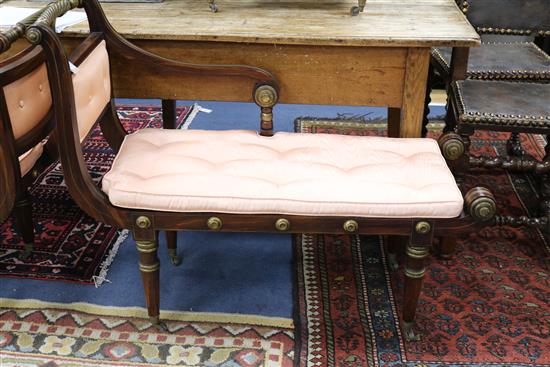 A pair of early 19th century American simulated rosewood chaises, L.3ft 9in. D.1ft 5in. H.2ft 11in.